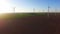 Anerial shot of wind turbines on field