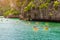 ANG THONG MARINE PARK, SAMUI, THAILAND - OCTOBER 13,2019 : Tourists kayaking in blue Idyllic turquoise ocean to explore near the