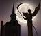Angel of Death in front of a church - Spooky night background with moon