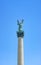 Angel Gabriel statue looks over Heroes Square in Budapest, Hungary.