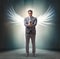 Angel investor concept with businessman with wings