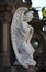 Angel statue on a cemetery Recoleta in Buenos Aires.