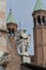 Angel statue on the facade of Cremona Cathedral, Italy