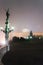 Angel statue and Vienna Museum Quarter fog and evening