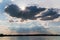 Angel wings cloud above lake