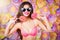 Angelica, lollipop sunglasses pink bikini pink background