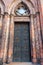 Angels carving on church doors in Berlin, Germany. Detail of the metallic panel on the temple doorway, entrance to the church.