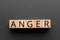 Anger - word from wooden blocks with letters