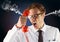 anger young man with steam on ears shouting to the phone. Black and blue background