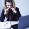 Angers, stressed and frustrated business woman breaking pencil a