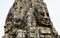 Angkor Thom with smiling buddha face at Angkor Wat Temple - Siem Reap, Cambodia