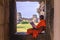 Angkor Wat, Cambodia - December 7, 2016: Monk reading