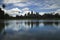 Angkor Wat and cloudy sky reflected in the water in Siem Reap, Cambodia