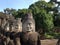 Angkor Wat faces. Statues of gods, asian ancient city,old khmer religion