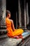 Angkor Wat monk. Ta Prohm Khmer ancient Buddhist temple in Cambo