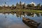 Angkor Wat reflection in lotus pond with boat on evening, Siem Reap, Cambodia