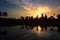 Angkor Wat temple at dramatic sunrise sunburst