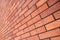 Angle view red brick wall