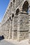 Angle view of segovia roman aqueduct arches, in autonomous region of Castile and Leon