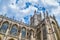 Angled perspective of Gothic Bath Abbey - a parish church of the Church of England and former Benedictine monastery in Bath