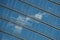 Angled view of cloud reflected in windows