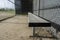 Angled view of the dugout on a baseball field, without any people around