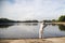 A angler casting at a serene lake