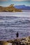 Angler with fishing rod on Atlantic road, Norway