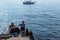 Angler on the pier in a wheelchair