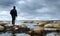 Angler on sea coast