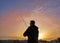 Angler with spinning rod fishing in Mediterranean