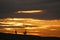 Anglers on Chesil Bank at sunset