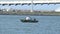 Anglers on the small boat fishing for flounder near Indian River Inlet