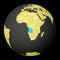 Angola on dark globe with yellow world map.