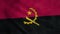 Angola national flag waving in wind. Realistic flag background