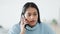 Angry, annoyed woman gets phone call on her smartphone, becoming frustrated and stressed. Irritated, upset young indian