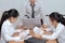 Angry asian boss standing and feeling displeased during meeting in office