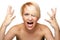 Angry blond girl screaming