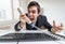 Angry boss or manager is calling and shouting to the telephone