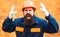 Angry builder. Incident at a construction site. Safety rules for builders. Bearded man in helmet on the construction of