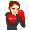 Angry business woman boxing punching ready to fight