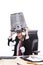 Angry businessman with rubbish bin on his head