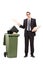 Angry businessman throwing his stuff in the trash