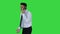 Angry businessman yelling at phone on a Green Screen, Chroma Key.