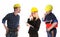 Angry businesswoman and construction workers