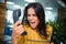 Angry businesswoman shouting on phone