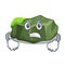 Angry cartoon large stone covered with green moss