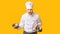 Angry Chef Shouting Holding Saucepan Standing On Yellow Background, Panorama