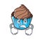 Angry chocolate cupcake mascot cartoon