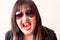 Angry crying brunette in sunglass